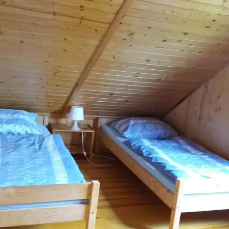 Letniskowy Mlyn Деревянный коттедж *